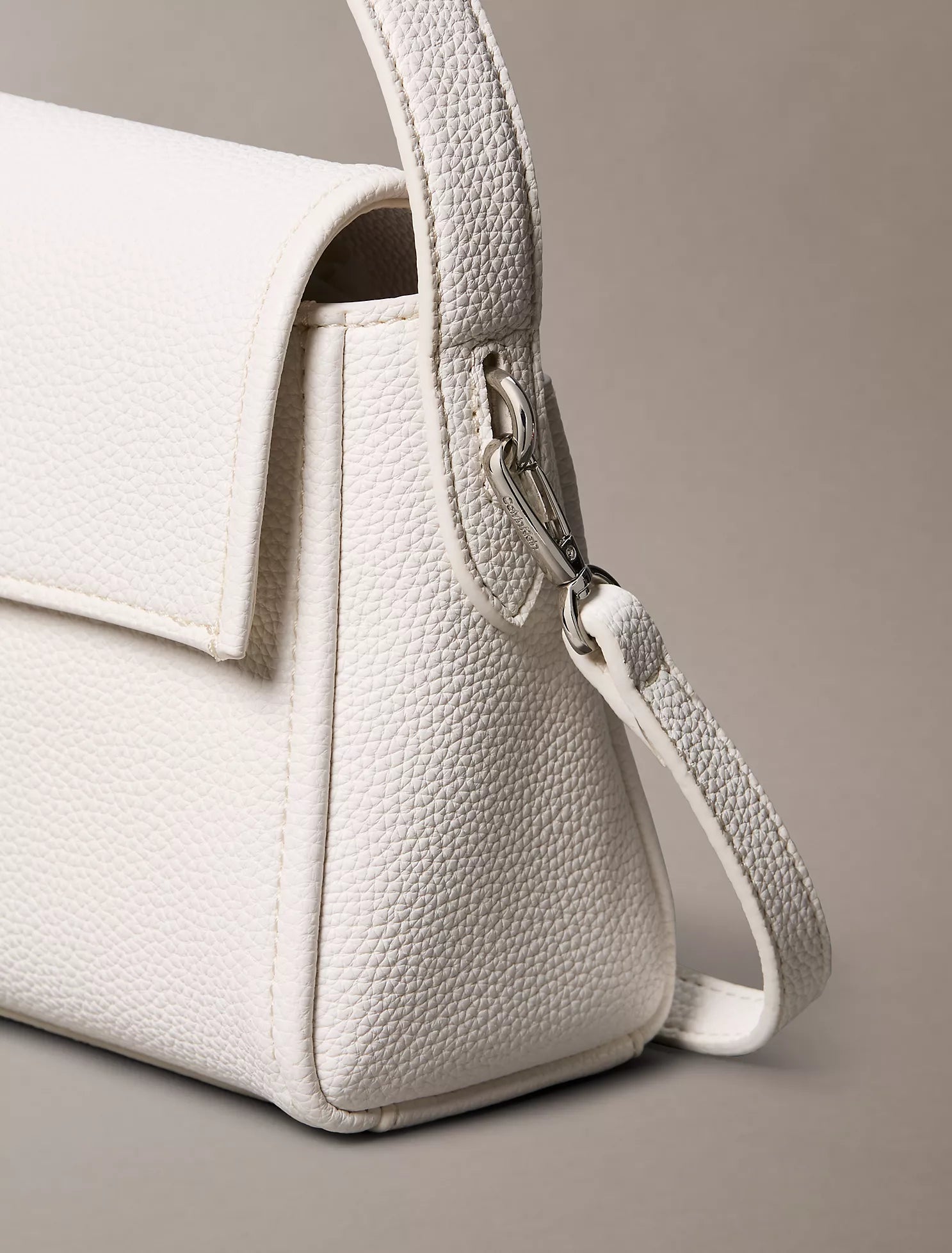 Emblem Logo Hardware Pebble Shoulder Bag